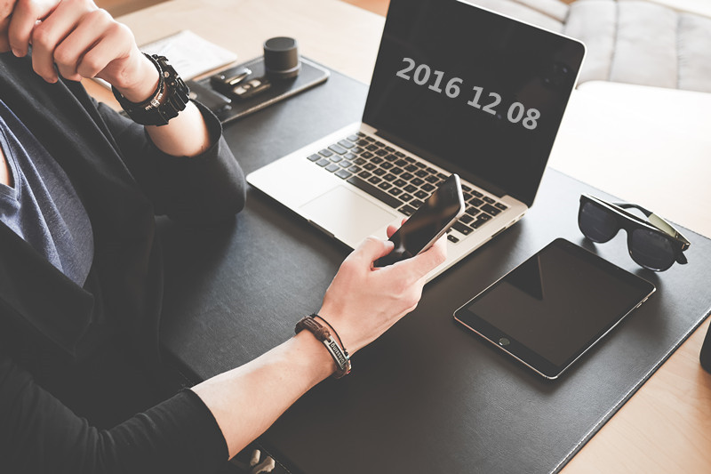 man-checking-his-iphone-working-at-home-office-picjumbo-com.jpg